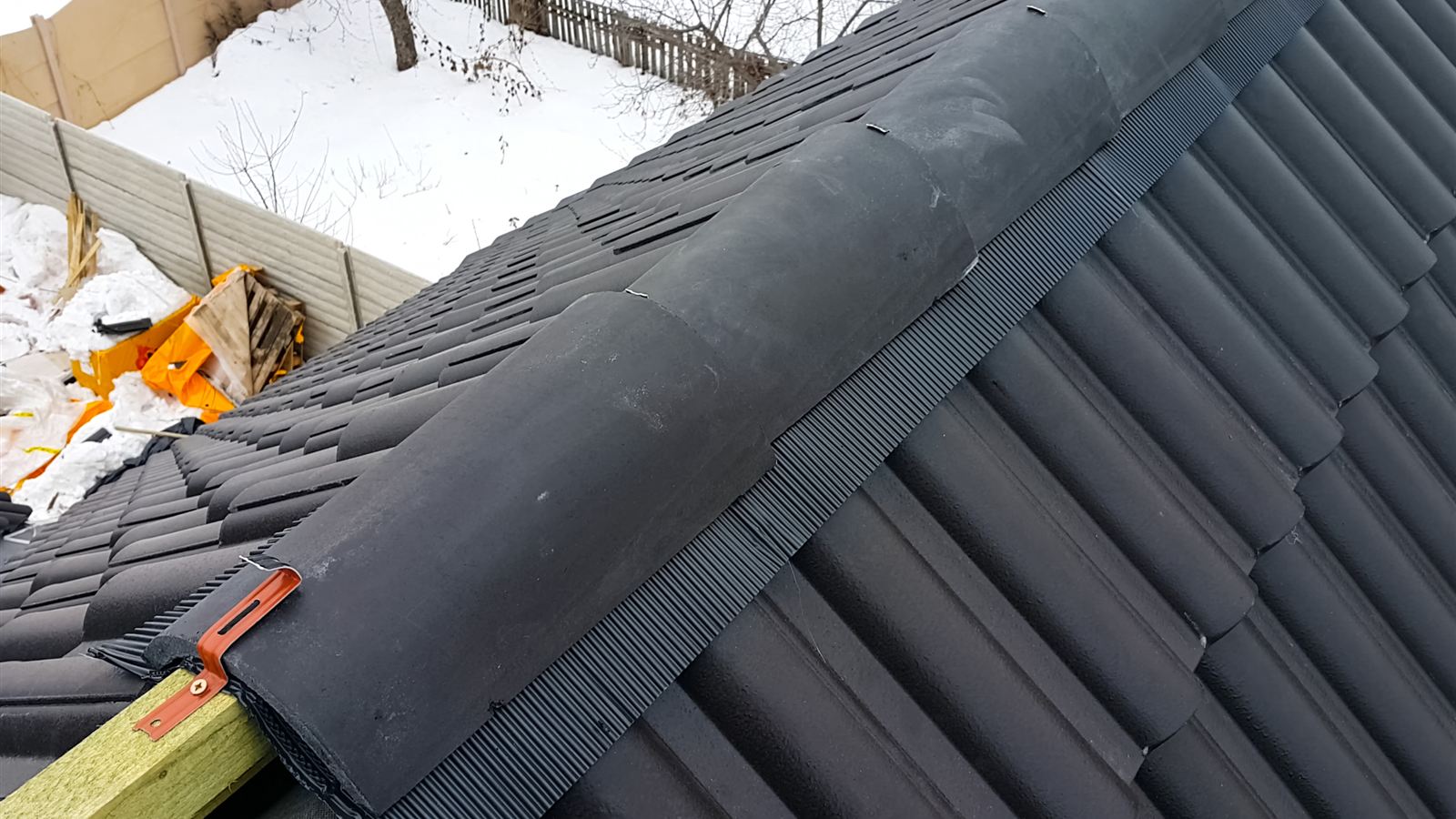 Photo of dry ridge roofing work